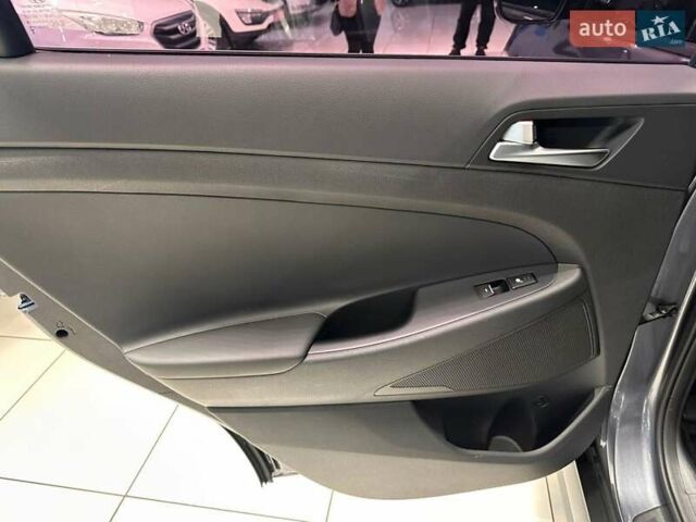 Серый Хендай Туксон, объемом двигателя 2 л и пробегом 69 тыс. км за 20900 $, фото 21 на Automoto.ua