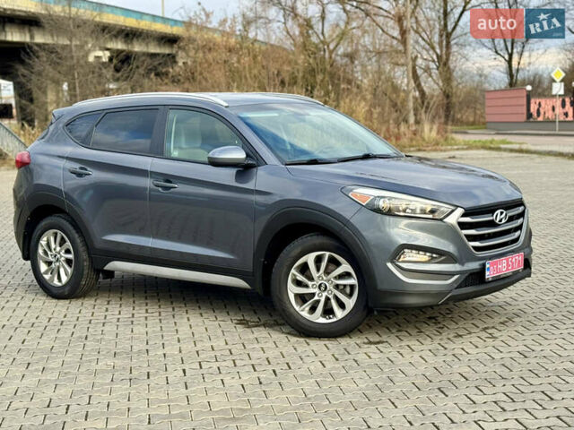 Серый Хендай Туксон, объемом двигателя 2 л и пробегом 183 тыс. км за 13750 $, фото 16 на Automoto.ua