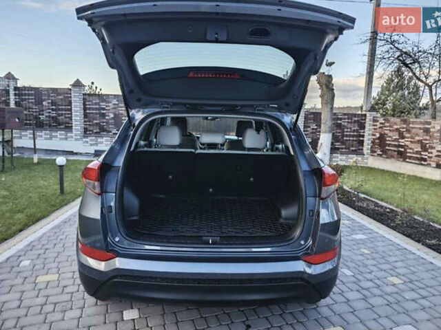 Серый Хендай Туксон, объемом двигателя 2 л и пробегом 68 тыс. км за 15500 $, фото 24 на Automoto.ua