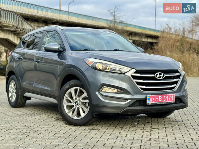 Серый Хендай Туксон, объемом двигателя 2 л и пробегом 183 тыс. км за 13750 $, фото 15 на Automoto.ua