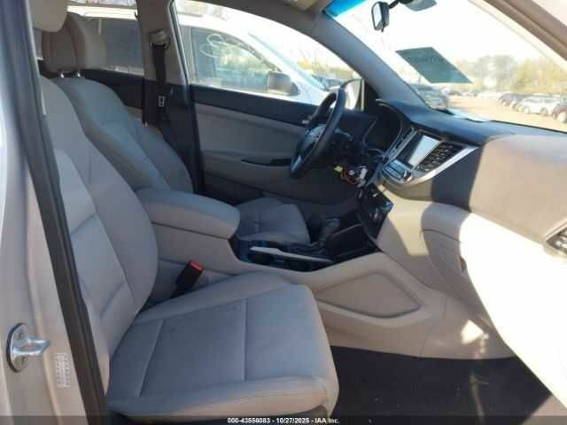 Серый Хендай Туксон, объемом двигателя 2 л и пробегом 70 тыс. км за 4000 $, фото 4 на Automoto.ua