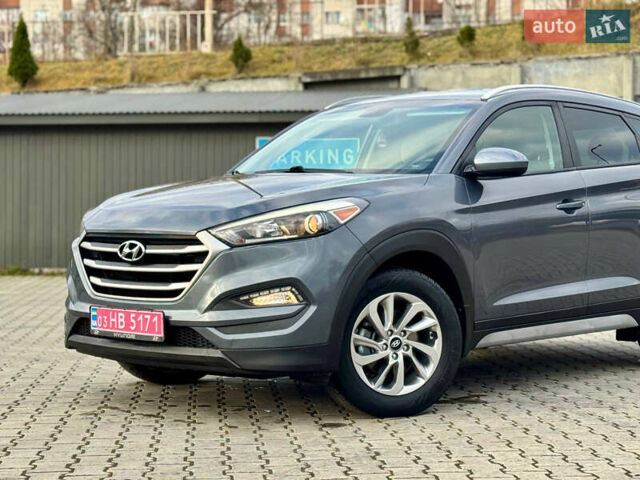 Сірий Хендай Туксон, об'ємом двигуна 2 л та пробігом 184 тис. км за 13950 $, фото 14 на Automoto.ua