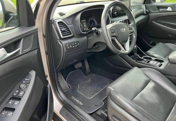 Серый Хендай Туксон, объемом двигателя 1.6 л и пробегом 93 тыс. км за 9000 $, фото 9 на Automoto.ua