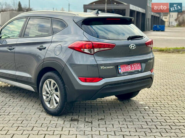 Сірий Хендай Туксон, об'ємом двигуна 2 л та пробігом 184 тис. км за 13950 $, фото 42 на Automoto.ua