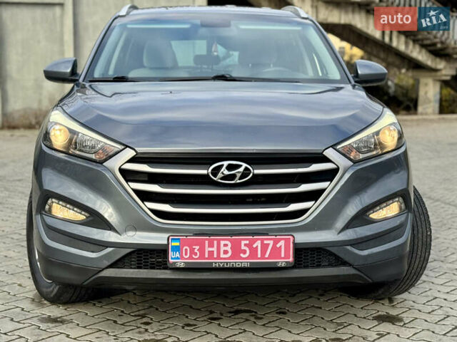 Серый Хендай Туксон, объемом двигателя 2 л и пробегом 183 тыс. км за 13750 $, фото 3 на Automoto.ua
