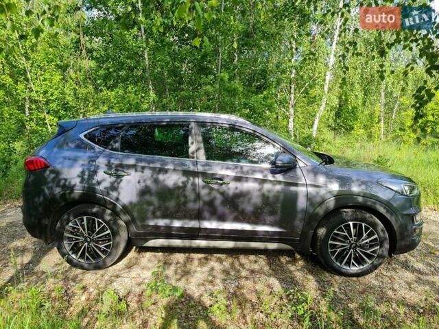 Серый Хендай Туксон, объемом двигателя 2 л и пробегом 163 тыс. км за 20700 $, фото 7 на Automoto.ua