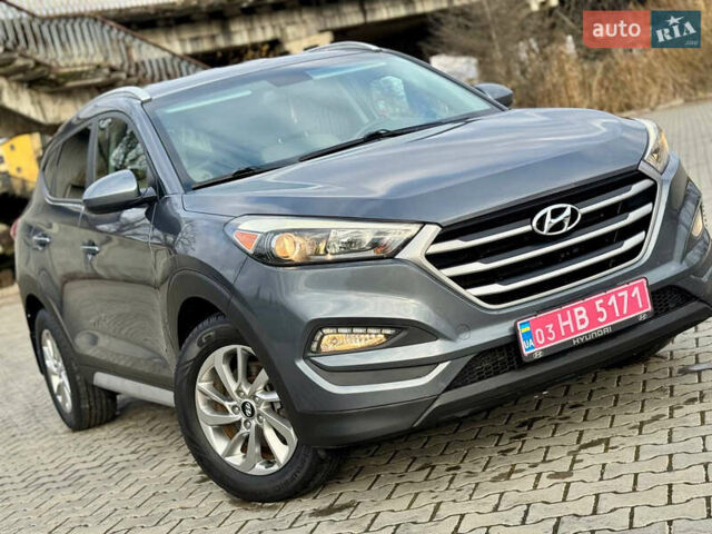 Сірий Хендай Туксон, об'ємом двигуна 2 л та пробігом 184 тис. км за 13950 $, фото 56 на Automoto.ua