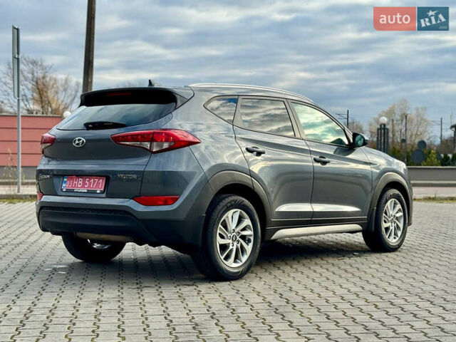 Сірий Хендай Туксон, об'ємом двигуна 2 л та пробігом 184 тис. км за 13950 $, фото 33 на Automoto.ua