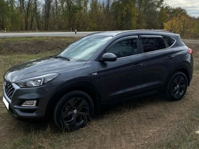 Серый Хендай Туксон, объемом двигателя 2 л и пробегом 99 тыс. км за 9600 $, фото 5 на Automoto.ua