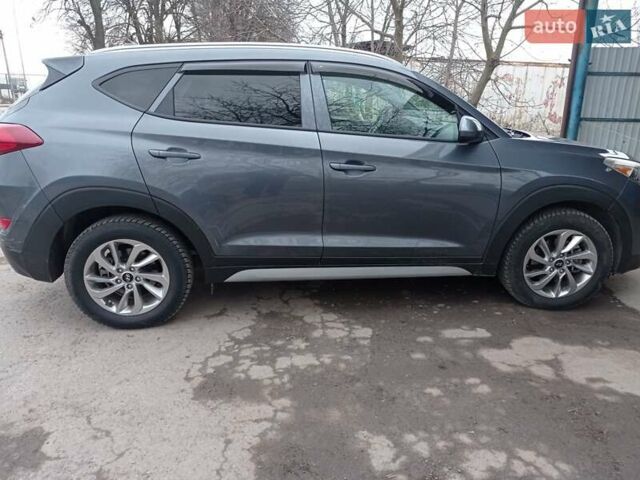 Серый Хендай Туксон, объемом двигателя 2 л и пробегом 128 тыс. км за 16500 $, фото 9 на Automoto.ua