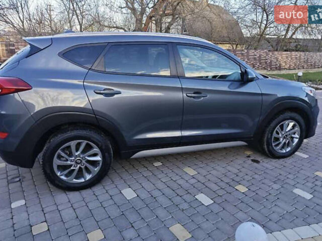Серый Хендай Туксон, объемом двигателя 2 л и пробегом 68 тыс. км за 15500 $, фото 10 на Automoto.ua