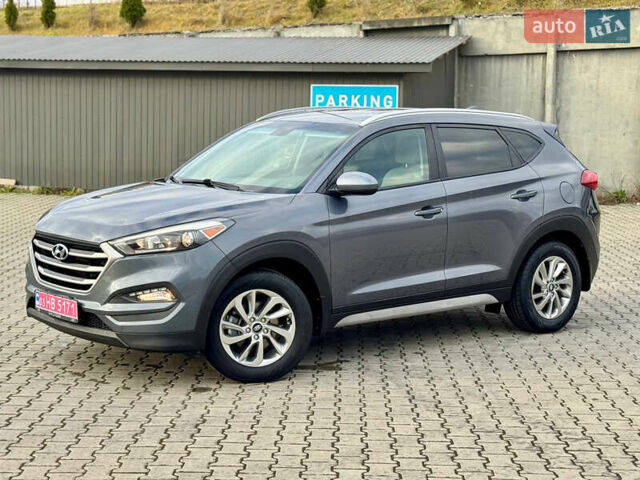 Сірий Хендай Туксон, об'ємом двигуна 2 л та пробігом 184 тис. км за 13950 $, фото 15 на Automoto.ua