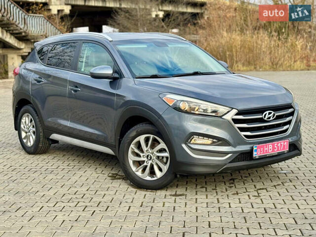 Сірий Хендай Туксон, об'ємом двигуна 2 л та пробігом 184 тис. км за 13950 $, фото 64 на Automoto.ua
