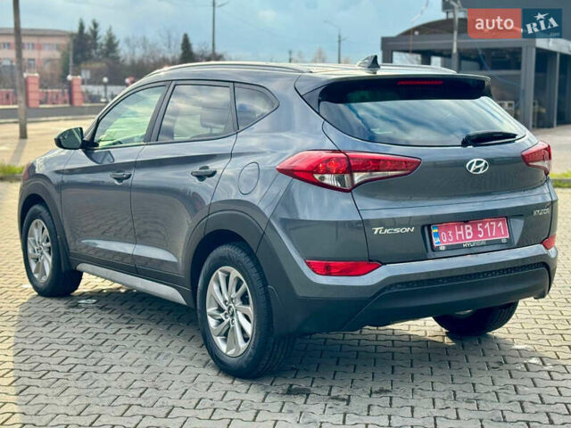 Сірий Хендай Туксон, об'ємом двигуна 2 л та пробігом 184 тис. км за 13950 $, фото 26 на Automoto.ua