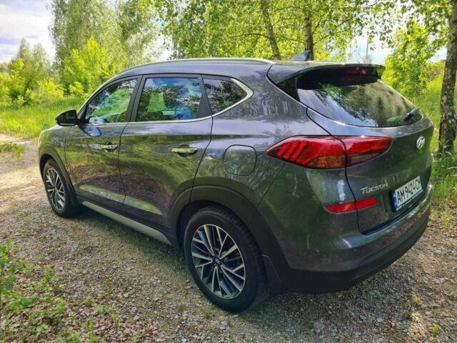 Серый Хендай Туксон, объемом двигателя 2 л и пробегом 168 тыс. км за 18400 $, фото 4 на Automoto.ua