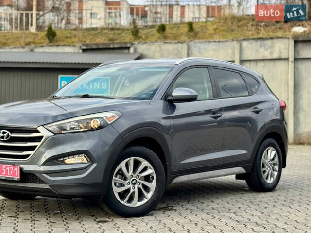 Сірий Хендай Туксон, об'ємом двигуна 2 л та пробігом 184 тис. км за 13950 $, фото 51 на Automoto.ua
