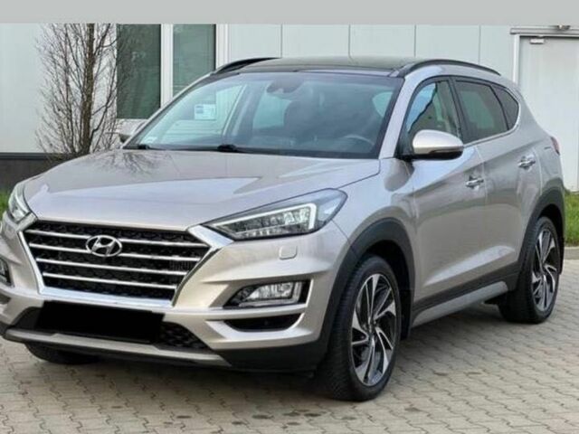 Серый Хендай Туксон, объемом двигателя 1.6 л и пробегом 93 тыс. км за 9000 $, фото 1 на Automoto.ua