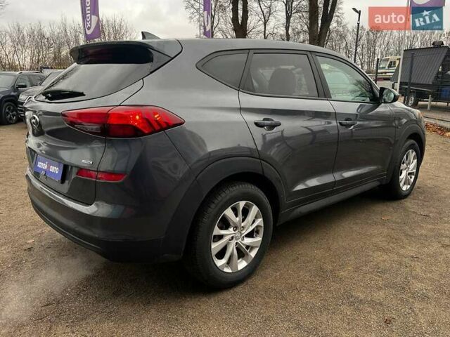 Серый Хендай Туксон, объемом двигателя 1.98 л и пробегом 139 тыс. км за 19500 $, фото 4 на Automoto.ua