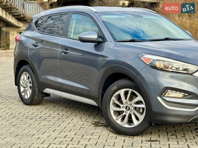 Сірий Хендай Туксон, об'ємом двигуна 2 л та пробігом 184 тис. км за 13950 $, фото 54 на Automoto.ua
