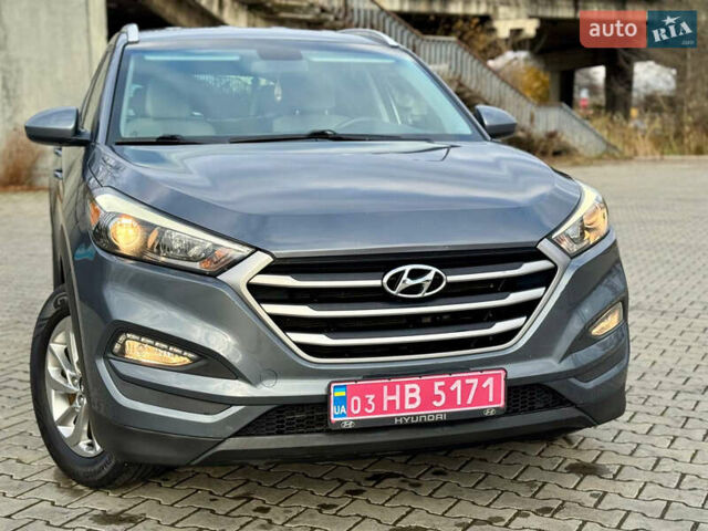 Сірий Хендай Туксон, об'ємом двигуна 2 л та пробігом 184 тис. км за 13950 $, фото 61 на Automoto.ua