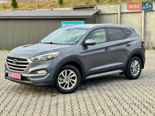 Сірий Хендай Туксон, об'ємом двигуна 2 л та пробігом 184 тис. км за 13950 $, фото 45 на Automoto.ua
