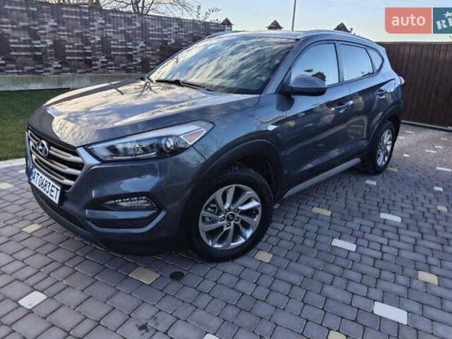 Серый Хендай Туксон, объемом двигателя 2 л и пробегом 68 тыс. км за 15500 $, фото 2 на Automoto.ua