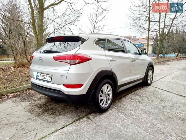 Сірий Хендай Туксон, об'ємом двигуна 2 л та пробігом 61 тис. км за 21900 $, фото 1 на Automoto.ua