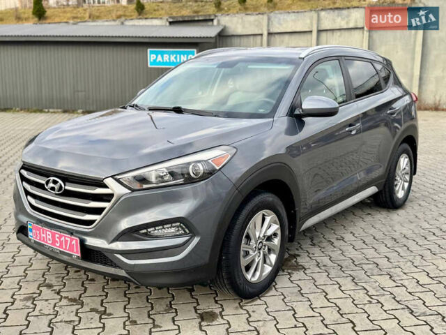 Сірий Хендай Туксон, об'ємом двигуна 2 л та пробігом 184 тис. км за 13950 $, фото 6 на Automoto.ua