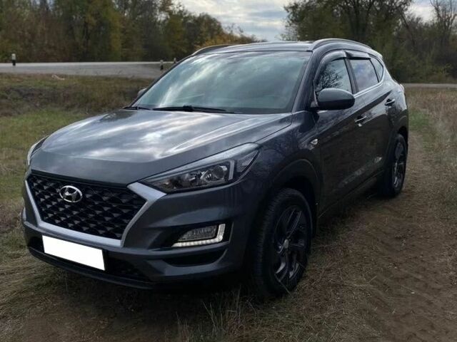 Серый Хендай Туксон, объемом двигателя 2 л и пробегом 99 тыс. км за 9600 $, фото 1 на Automoto.ua