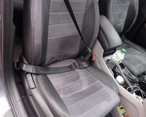 Серый Хендай Туксон, объемом двигателя 2 л и пробегом 128 тыс. км за 16500 $, фото 6 на Automoto.ua