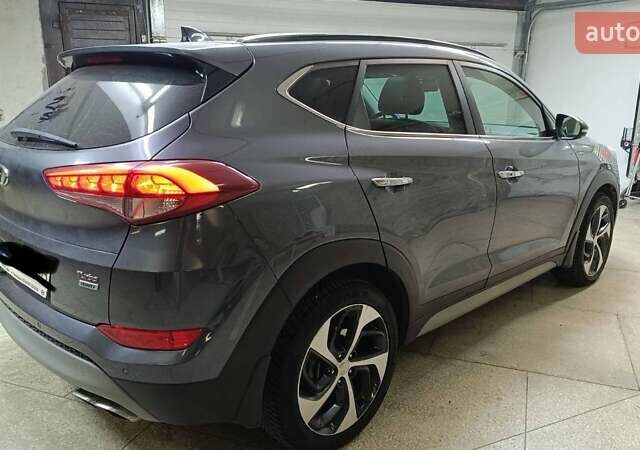 Сірий Хендай Туксон, об'ємом двигуна 1.6 л та пробігом 75 тис. км за 21000 $, фото 27 на Automoto.ua