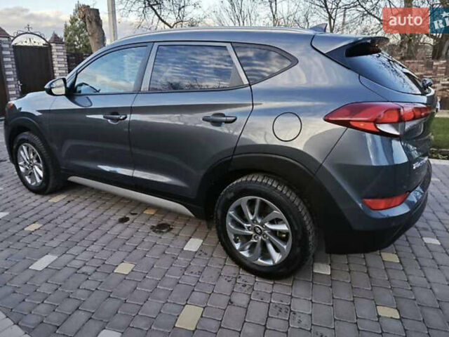 Серый Хендай Туксон, объемом двигателя 2 л и пробегом 68 тыс. км за 15500 $, фото 19 на Automoto.ua