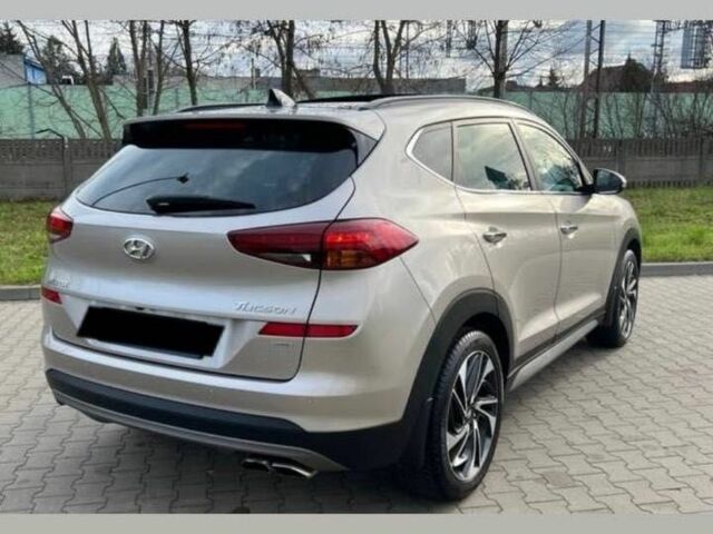 Серый Хендай Туксон, объемом двигателя 1.6 л и пробегом 93 тыс. км за 9000 $, фото 4 на Automoto.ua