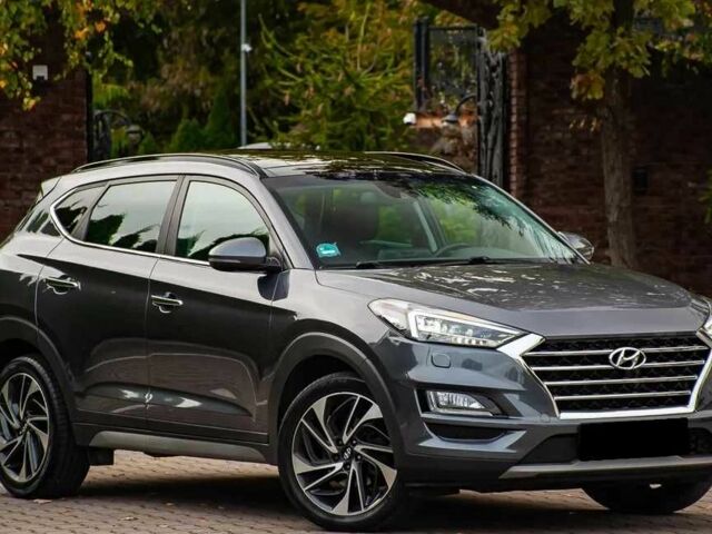 Серый Хендай Туксон, объемом двигателя 1.6 л и пробегом 100 тыс. км за 9900 $, фото 5 на Automoto.ua