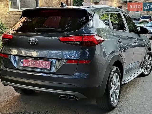 Серый Хендай Туксон, объемом двигателя 2 л и пробегом 97 тыс. км за 21888 $, фото 6 на Automoto.ua