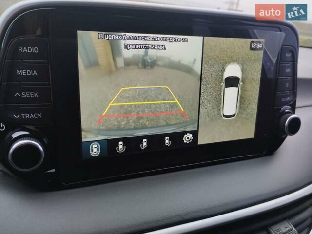 Сірий Хендай Туксон, об'ємом двигуна 2 л та пробігом 62 тис. км за 22800 $, фото 41 на Automoto.ua