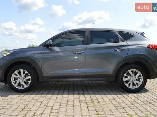 Серый Хендай Туксон, объемом двигателя 2 л и пробегом 168 тыс. км за 16500 $, фото 3 на Automoto.ua