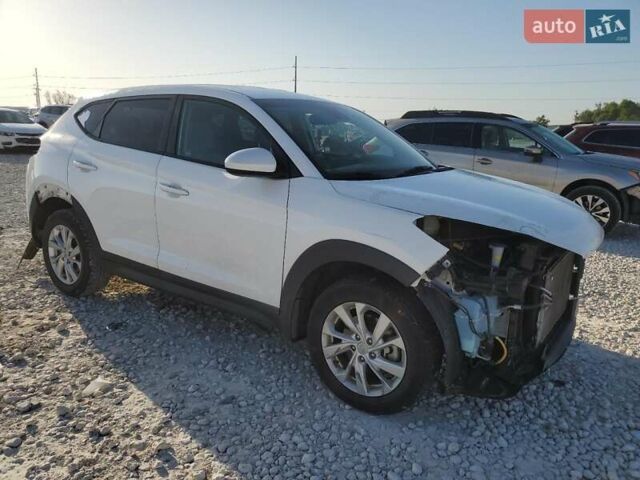 Серый Хендай Туксон, объемом двигателя 2 л и пробегом 94 тыс. км за 3000 $, фото 3 на Automoto.ua