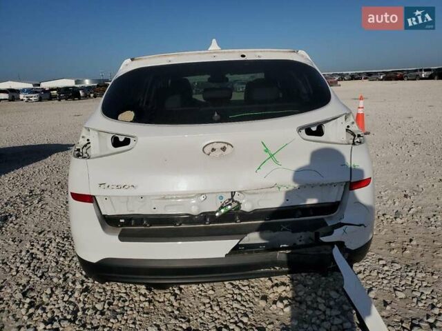 Серый Хендай Туксон, объемом двигателя 2 л и пробегом 94 тыс. км за 3000 $, фото 5 на Automoto.ua