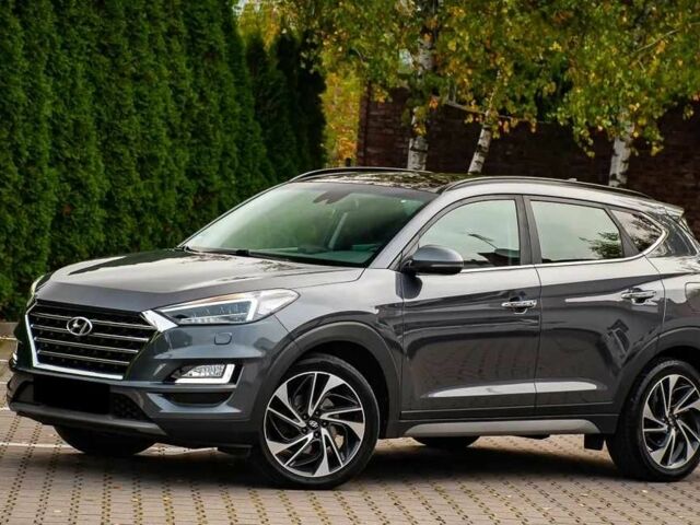 Серый Хендай Туксон, объемом двигателя 1.6 л и пробегом 100 тыс. км за 9900 $, фото 2 на Automoto.ua