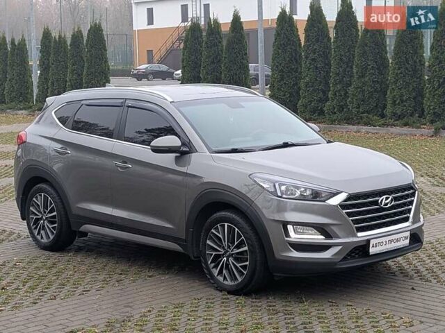 Серый Хендай Туксон, объемом двигателя 2 л и пробегом 204 тыс. км за 17500 $, фото 4 на Automoto.ua