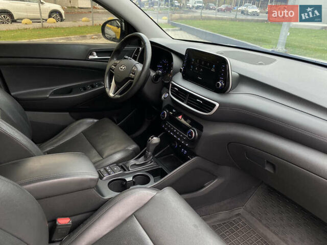 Серый Хендай Туксон, объемом двигателя 2 л и пробегом 73 тыс. км за 22400 $, фото 14 на Automoto.ua