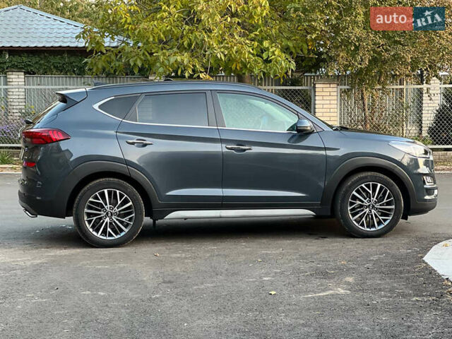 Серый Хендай Туксон, объемом двигателя 2.36 л и пробегом 85 тыс. км за 22500 $, фото 3 на Automoto.ua