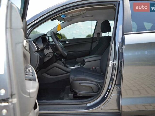 Серый Хендай Туксон, объемом двигателя 2 л и пробегом 168 тыс. км за 16500 $, фото 16 на Automoto.ua