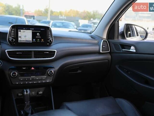 Сірий Хендай Туксон, об'ємом двигуна 2.36 л та пробігом 118 тис. км за 19000 $, фото 13 на Automoto.ua