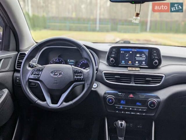 Серый Хендай Туксон, объемом двигателя 2 л и пробегом 204 тыс. км за 17500 $, фото 15 на Automoto.ua