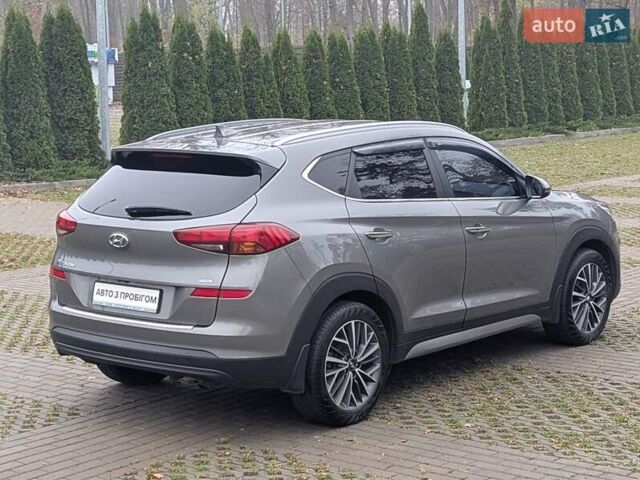 Серый Хендай Туксон, объемом двигателя 2 л и пробегом 204 тыс. км за 17500 $, фото 7 на Automoto.ua