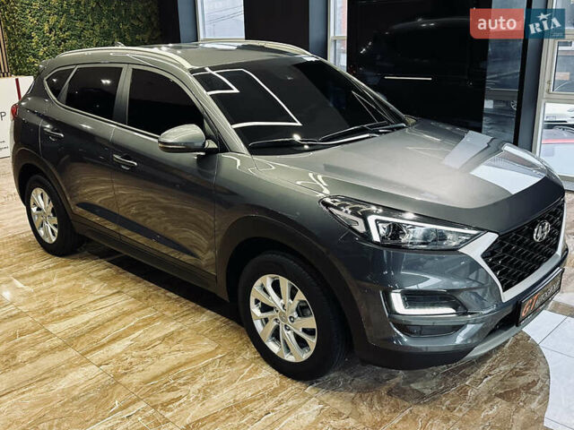 Серый Хендай Туксон, объемом двигателя 1.6 л и пробегом 147 тыс. км за 20500 $, фото 4 на Automoto.ua