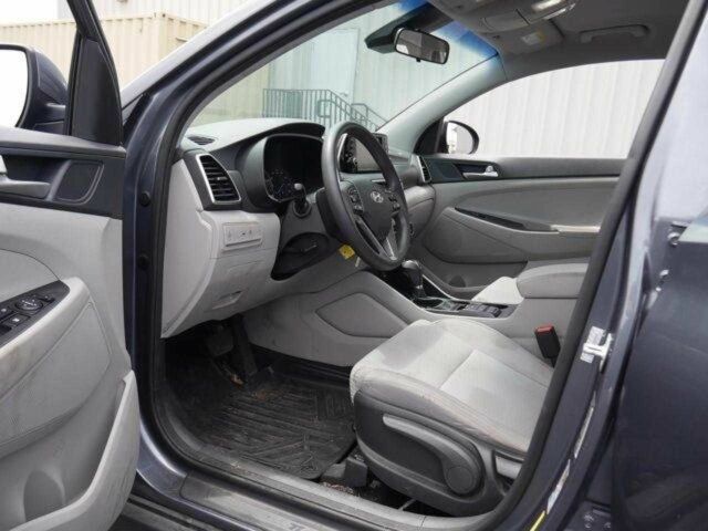 Серый Хендай Туксон, объемом двигателя 2 л и пробегом 149 тыс. км за 15000 $, фото 14 на Automoto.ua