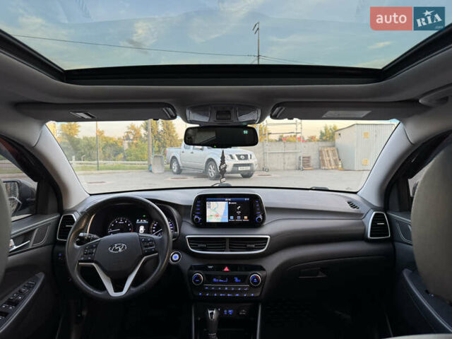 Серый Хендай Туксон, объемом двигателя 2 л и пробегом 130 тыс. км за 22700 $, фото 14 на Automoto.ua